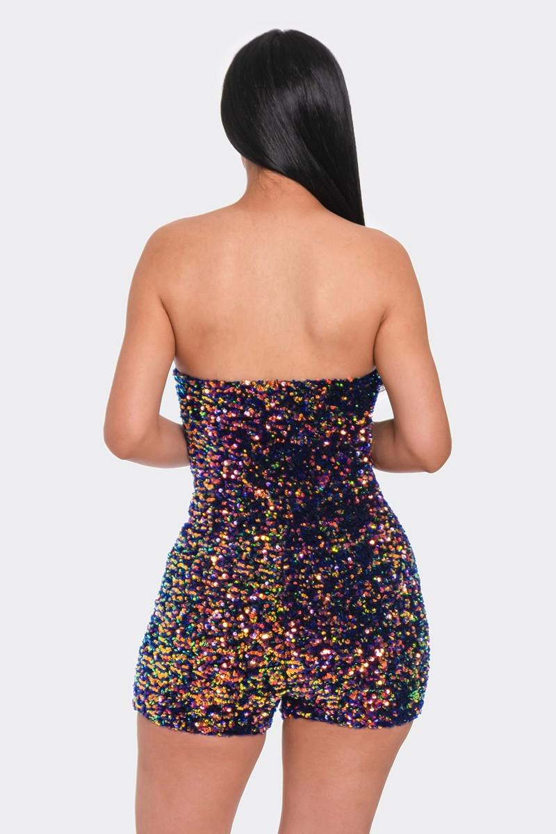 Back view of multi sequins tube top romper in navy and gold with illusion neckline, featuring a strapless design.