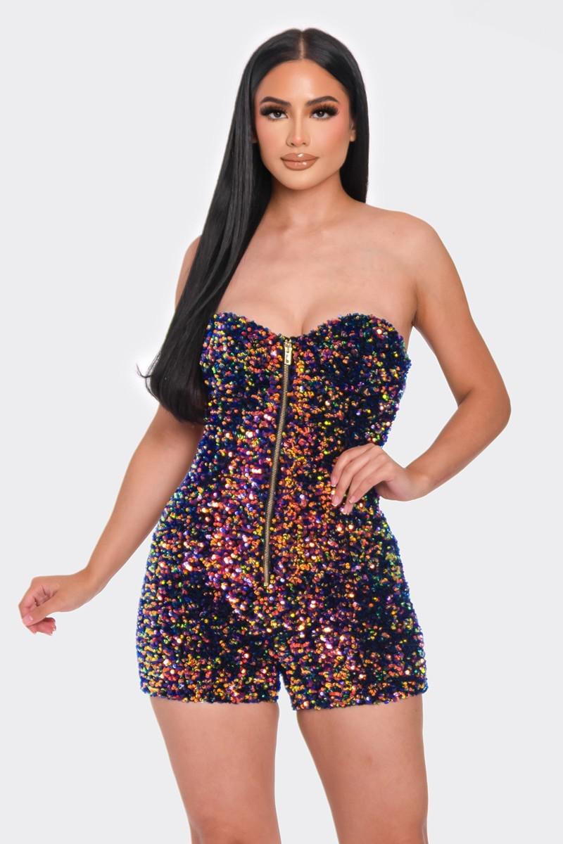 Strapless navy and gold sequined romper with gold zipper front and illusion neckline, available in sizes S, M, L.