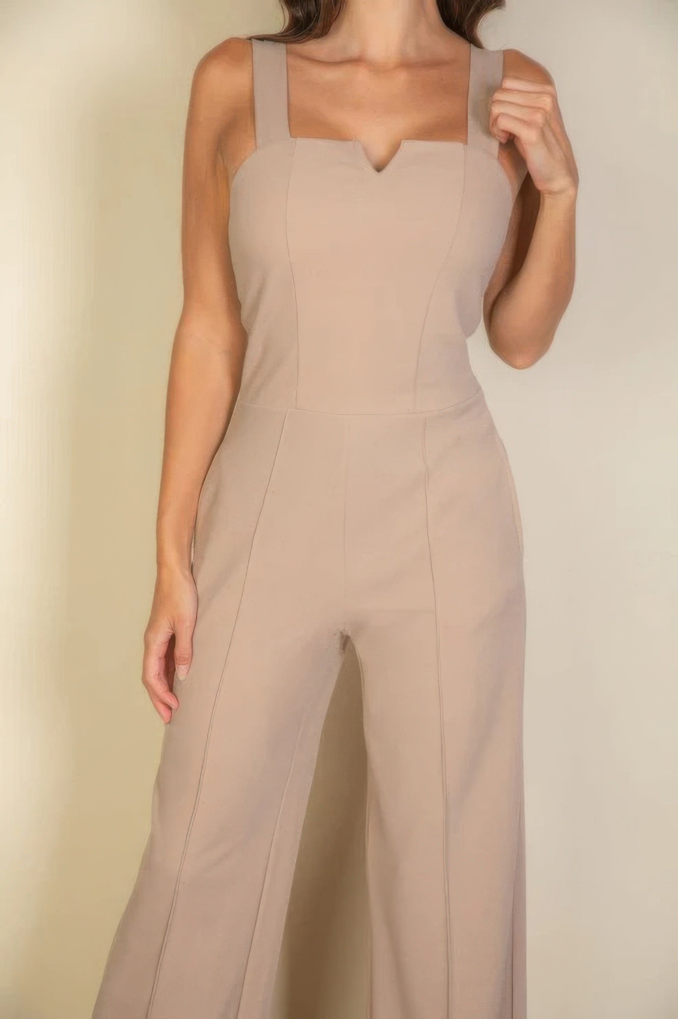 Taupe notched neck cami jumpsuit with flattering fit and modern design, perfect for versatile styling and all-day comfort.