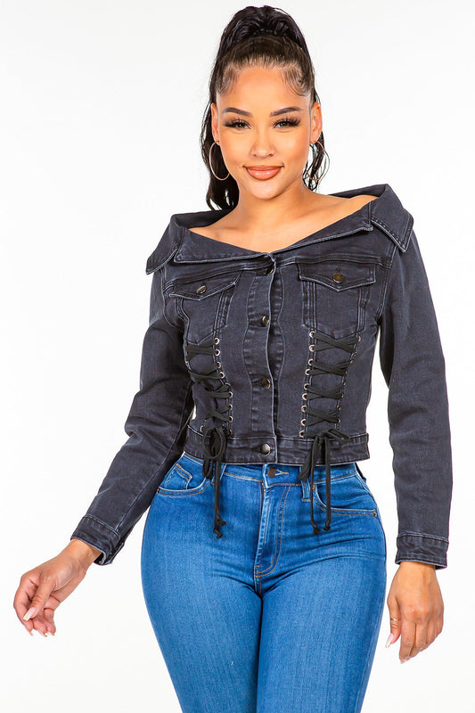 Trendy off-shoulder lace-up denim jacket with fitted silhouette, perfect for transitioning from casual to dressy occasions.