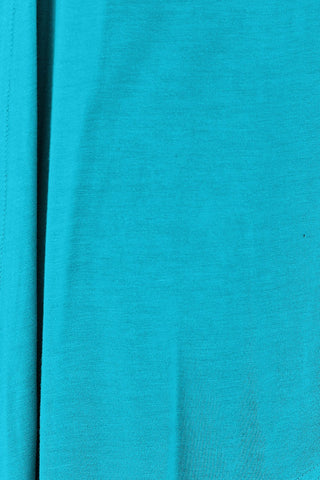 Close-up of turquoise open front long sleeve cardigan fabric with slightly stretchy rayon and spandex blend.