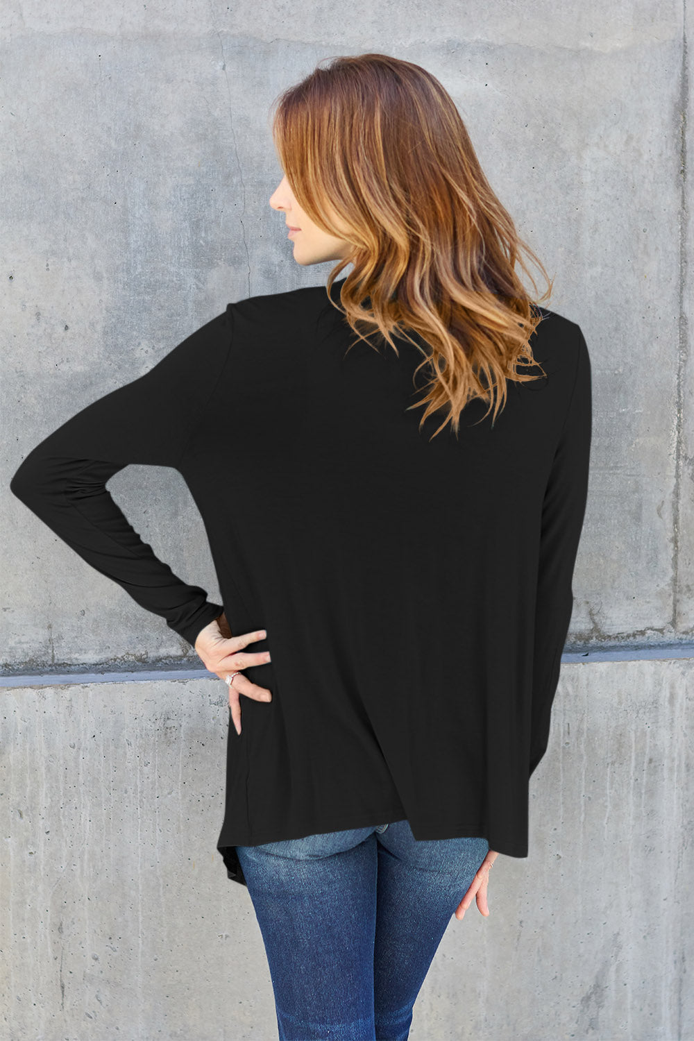 Open front long sleeve cardigan in black, made of 95% rayon and 5% spandex, slightly stretchy, full size, back view.