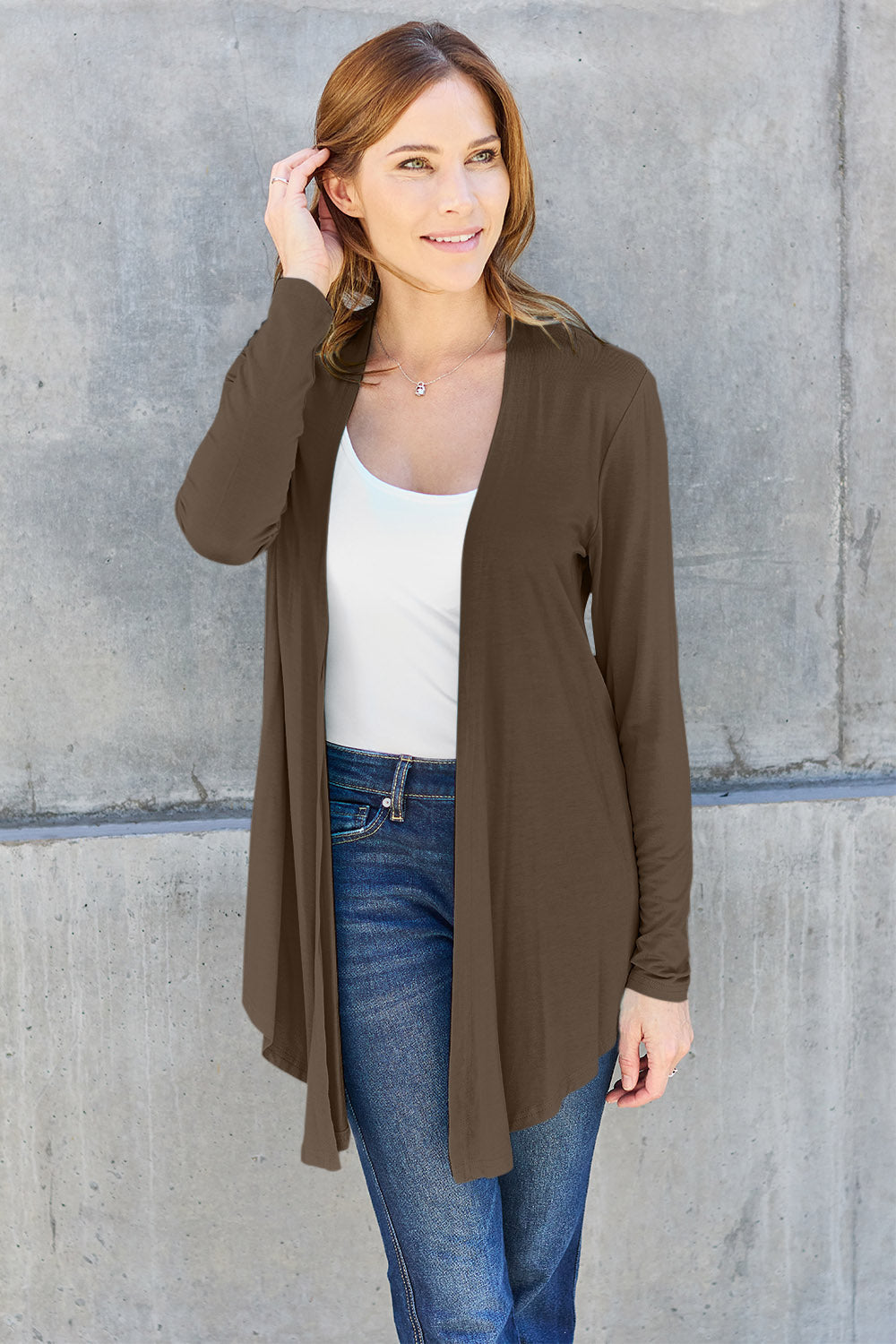 Woman wearing open front long sleeve cardigan, basic style, slightly stretchy, 95% rayon, 5% spandex, casual fashion look