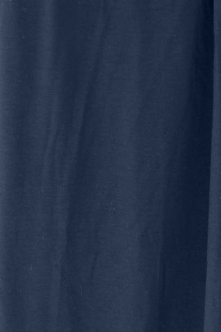 Close-up of navy blue opaque fabric with slightly stretchy texture suitable for a long sleeve cover up made of rayon and spandex.