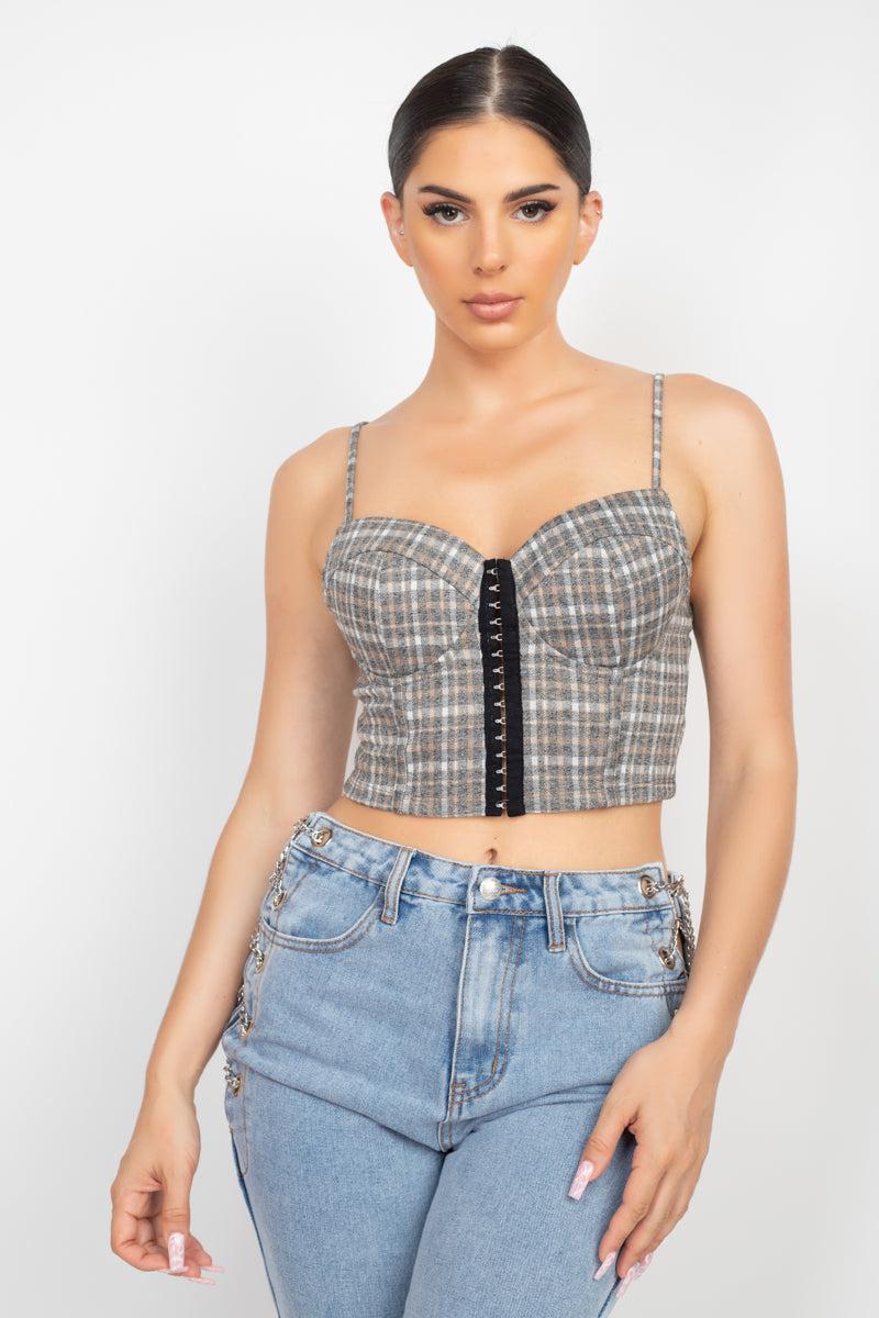 Plaid Hook & Eye Sweetheart Crop Top with adjustable straps, plaid pattern, and front closure, worn by model with light blue jeans.