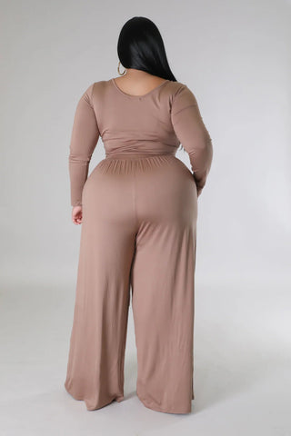 Chic plus size crop top and loose pants set with long sleeves and high-waisted design in soft, breathable fabric, back view.