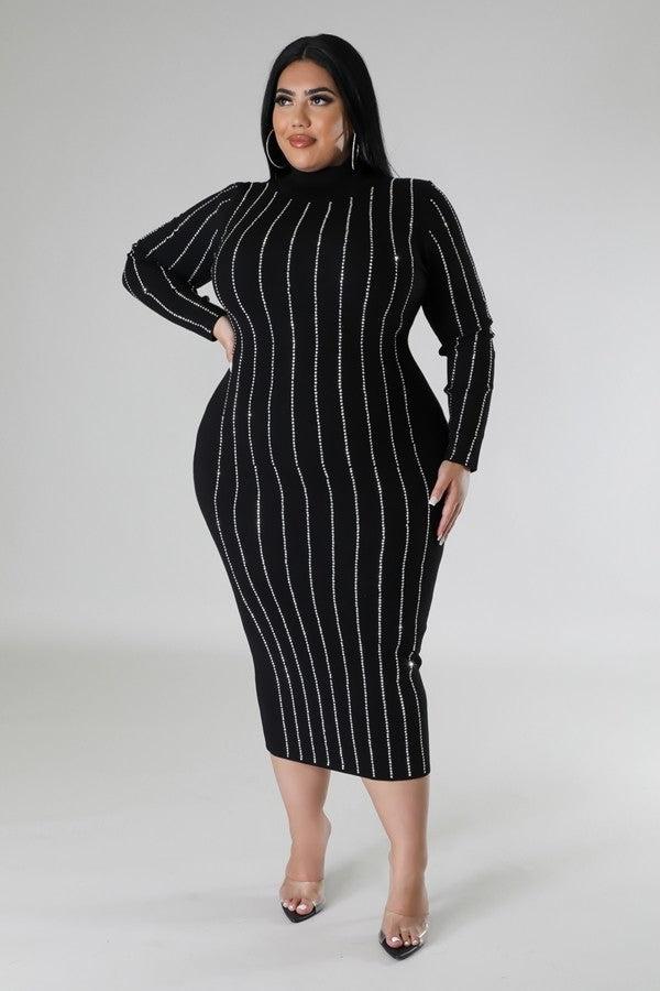 Plus size black turtle neck dress with rhinestone detailing, long sleeves, and stretchy fabric for a chic girls night look.