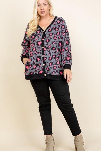 Plus size cozy animal print button-up cardigan in grey and neon pink with side pockets, made in USA.