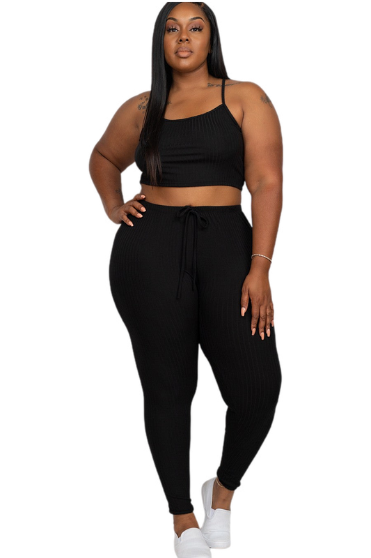 Plus size model wearing black cropped cami and leggings set, rib knit fabric, soft stretch, casual women's fashion outfit