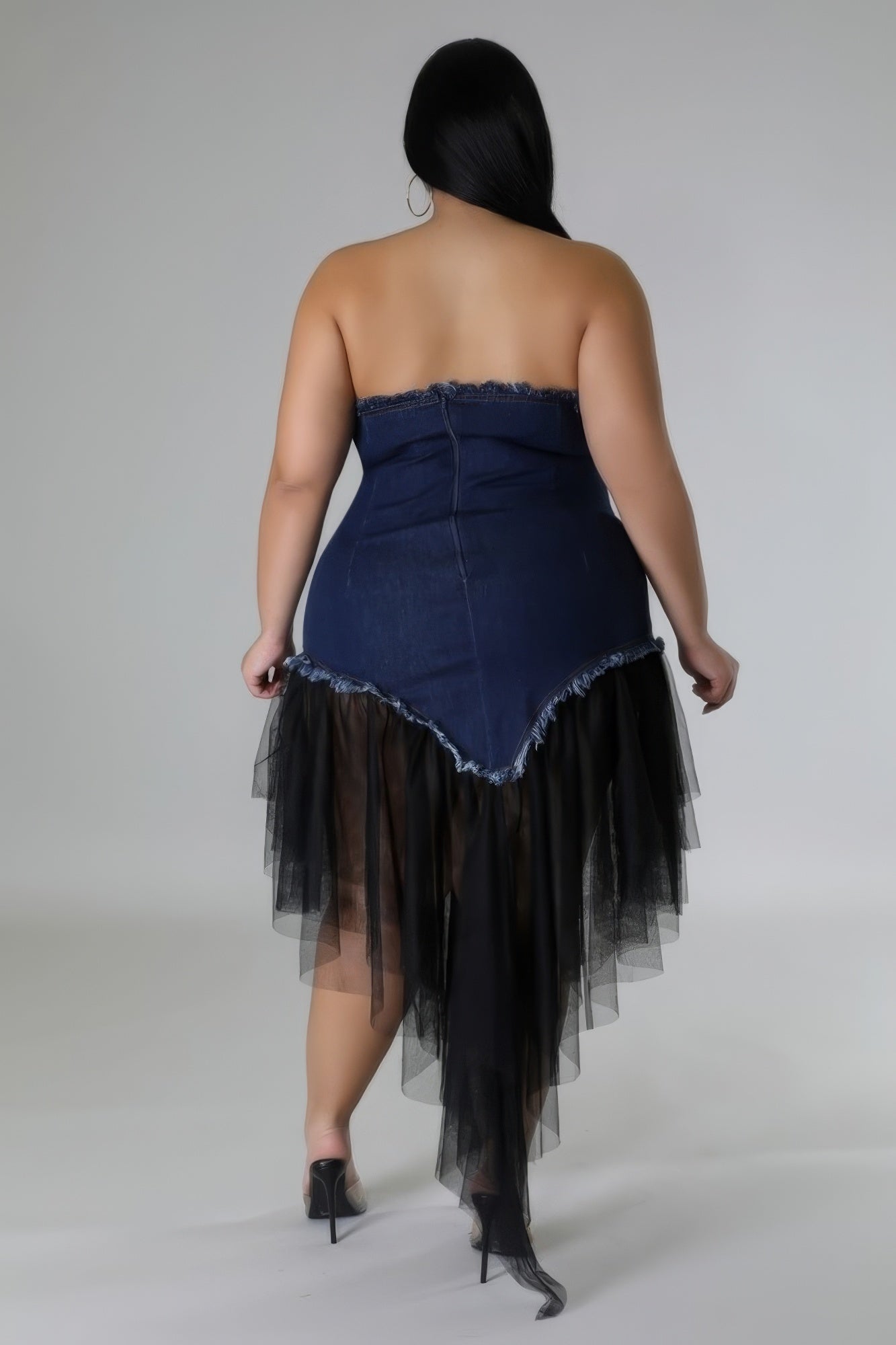 Plus size denim tube dress with a sweetheart neckline and tulle overlay, shown from the back.