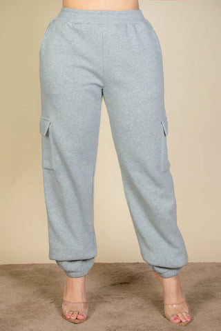 plus size side pocket drawstring waist sweatpants for women in soft gray fabric showcasing comfort and style.