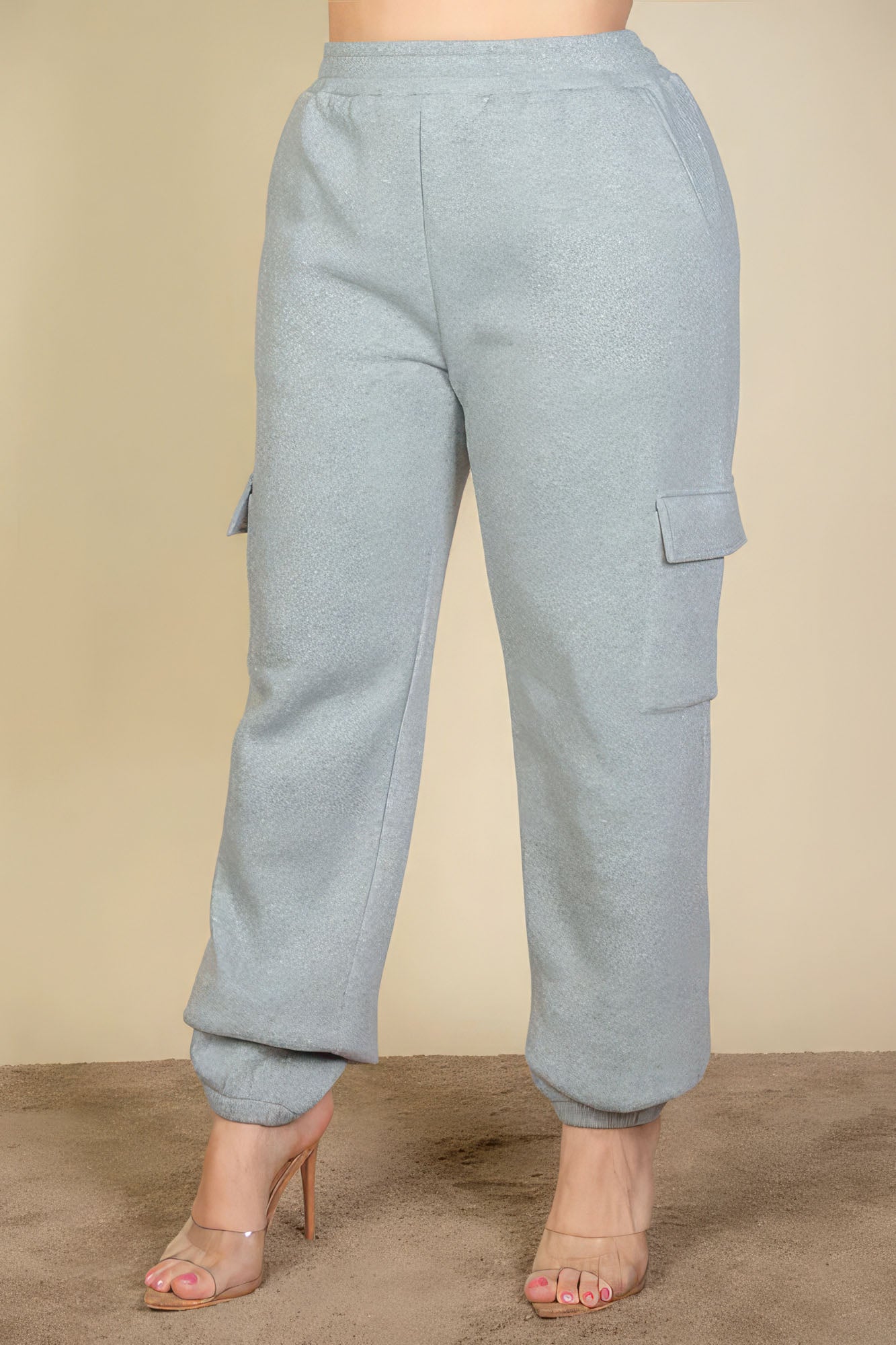 Plus size gray sweatpants with side pockets and drawstring waist, women's loungewear for comfort and style.