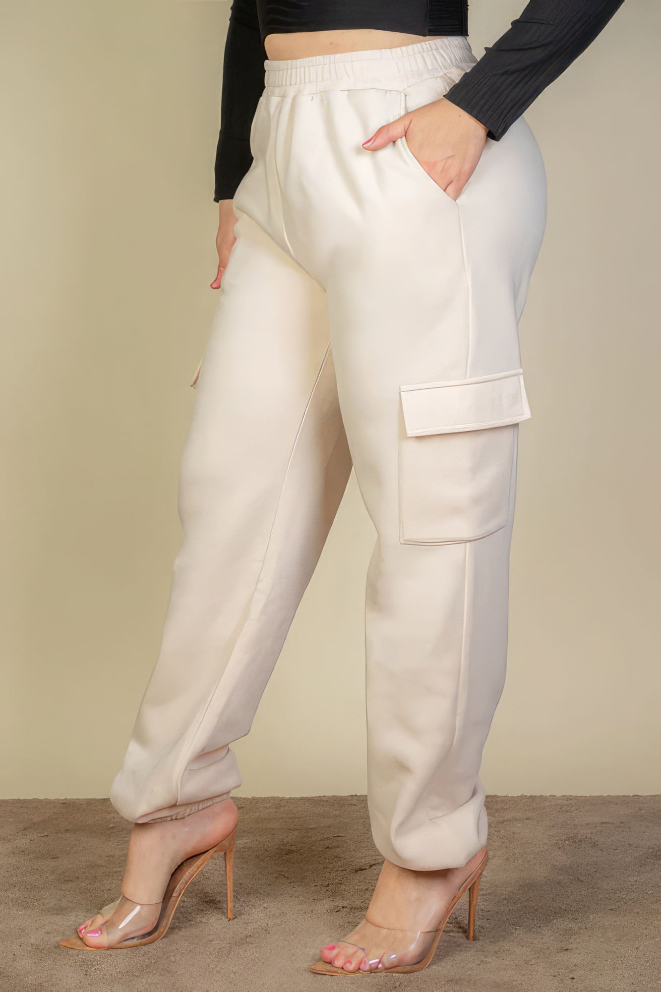 Plus size side pocket drawstring waist sweatpants in soft fabric, featuring a comfortable and stylish fit for women's loungewear.