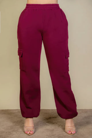 Plus size burgundy sweatpants with side pockets and drawstring waist for women, showcasing a comfortable and stylish loungewear fit.