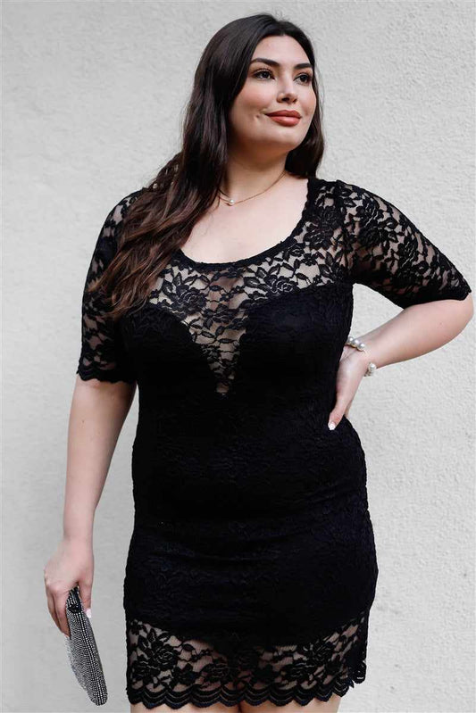 Plus size model wearing a black lace mini dress with midi sleeves and round neckline, showcasing elegant and classy style.