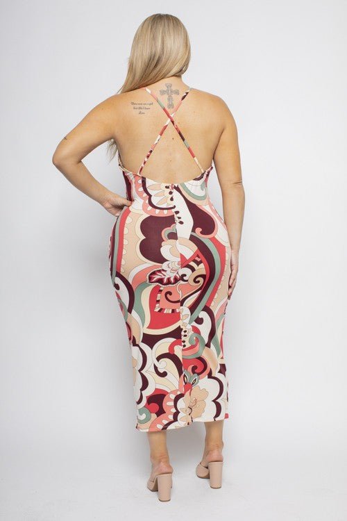 Plus size floral multi print cross back midi dress with vibrant patterns, showcasing back view.