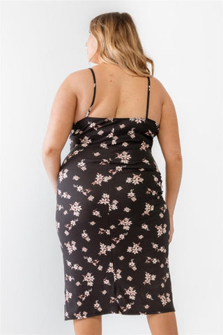 Plus size black floral ribbed ruched midi dress with sleeveless straps and side slit, back view.