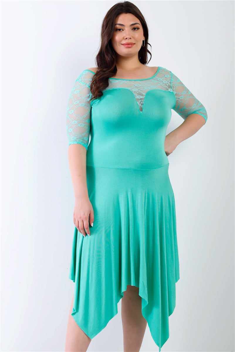 Plus size mint lace midi dress with handkerchief hem, featuring short sleeves and round neckline, modeled on a woman.