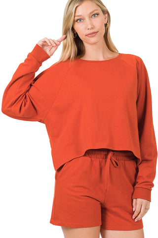 Plus size copper French terry oversized top and shorts set with drawstring waist and raglan sleeves, relaxed fit.