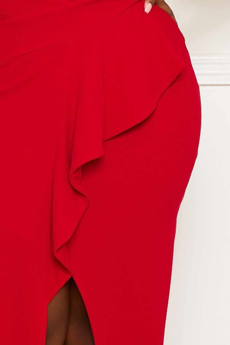 Red pleated plus size maxi dress with front ruffle and slit, showing close-up detail of the fabric and design.