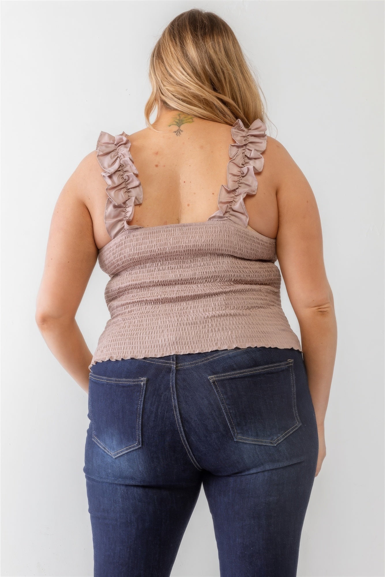 Plus size mauve tank top with ruffle straps and smocked back, shown from behind for a trendy and comfortable look.