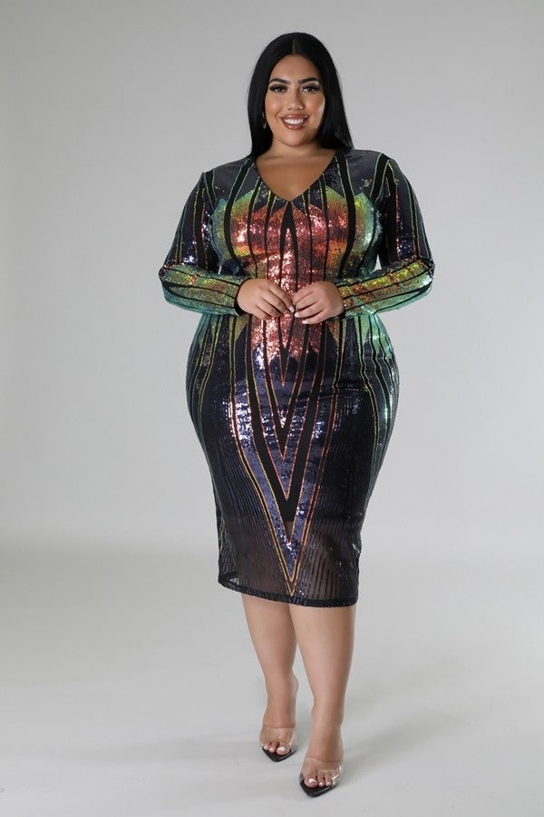 Plus size multi-color sequin stretch midi dress with long sleeves and V-cut, featuring a zipper closure.