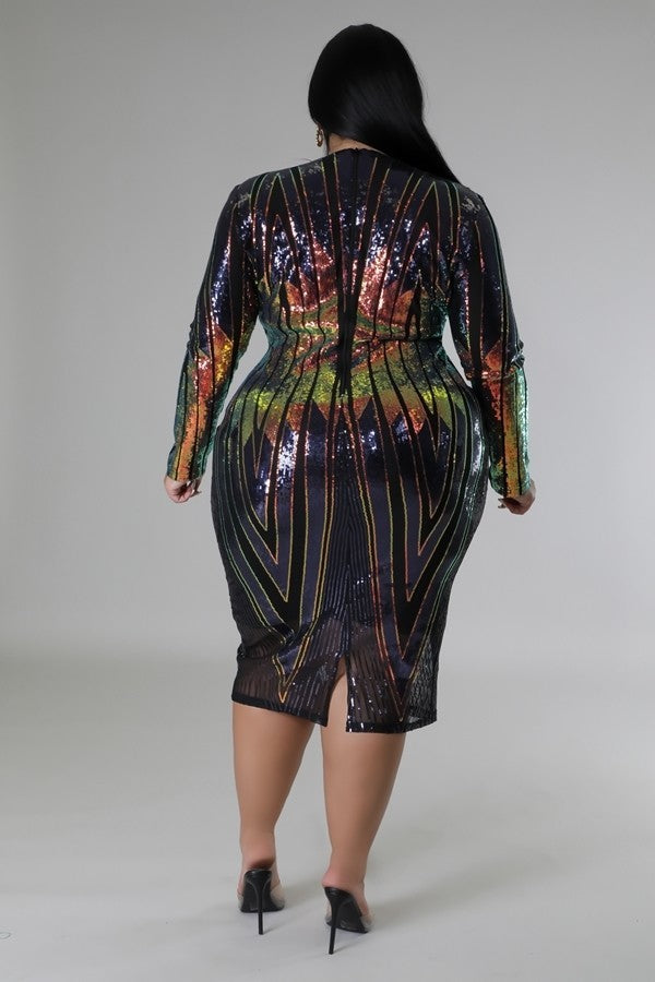 Plus size sequin midi dress with long sleeves and V-cut back, featuring multi-color stretch fabric and zipper closure.