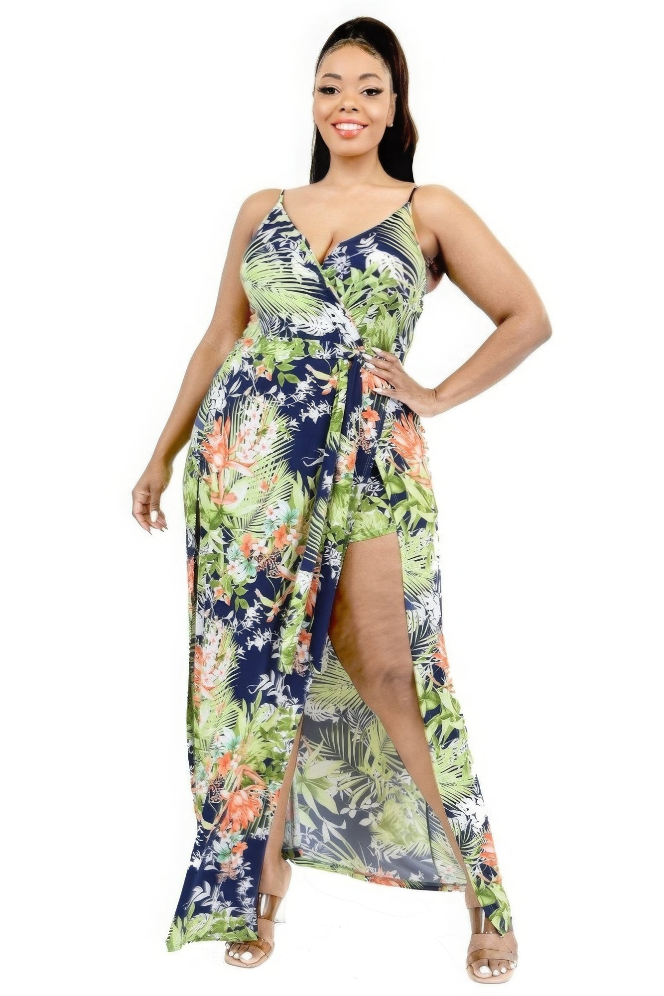 Women's plus size tropical leaf print maxi dress with wrap front and shorts, perfect for summer occasions and beach vacations.