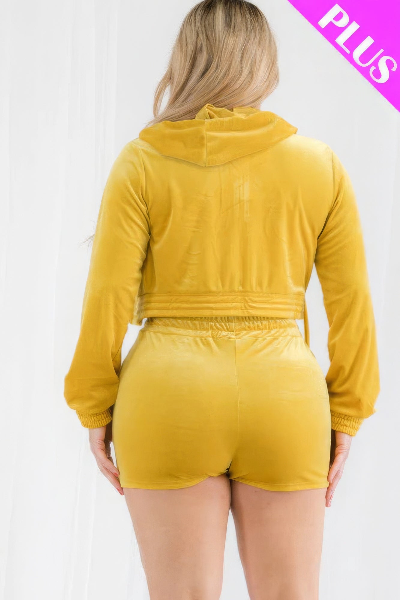 Plus size yellow velour crop hoodie and shorts set, perfect for casual outings, featuring a trendy design and comfortable fit.