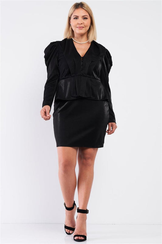 Plus size model wearing a Victorian V-neck black button fitted dress with puff shoulders and flare hem, styled for a chic look.