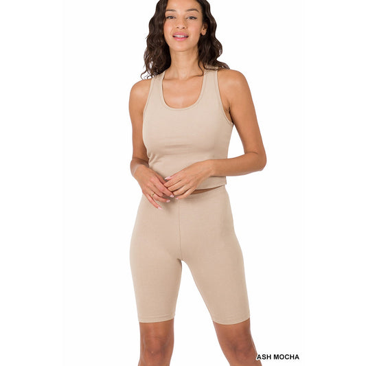 Woman wearing ash mocha racerback tank top biker shorts set made of 95% cotton and 5% spandex.