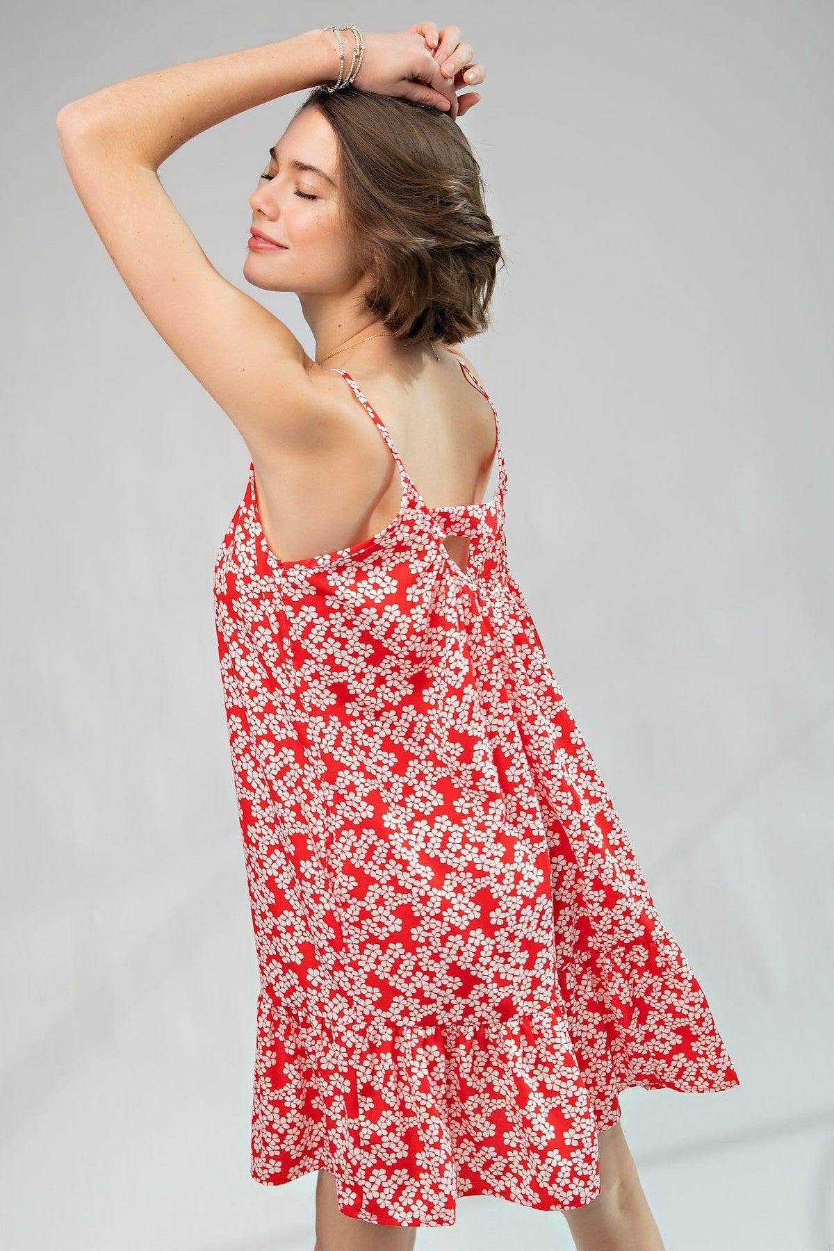 Red floral printed wool peach cami dress with spaghetti straps, scoop neckline, and ruffled bottom, made in USA.