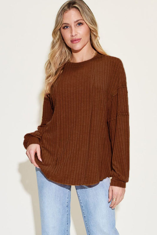 Ribbed round neck long sleeve t-shirt in brown with exposed seam, featuring moderate stretch and a comfortable fit.