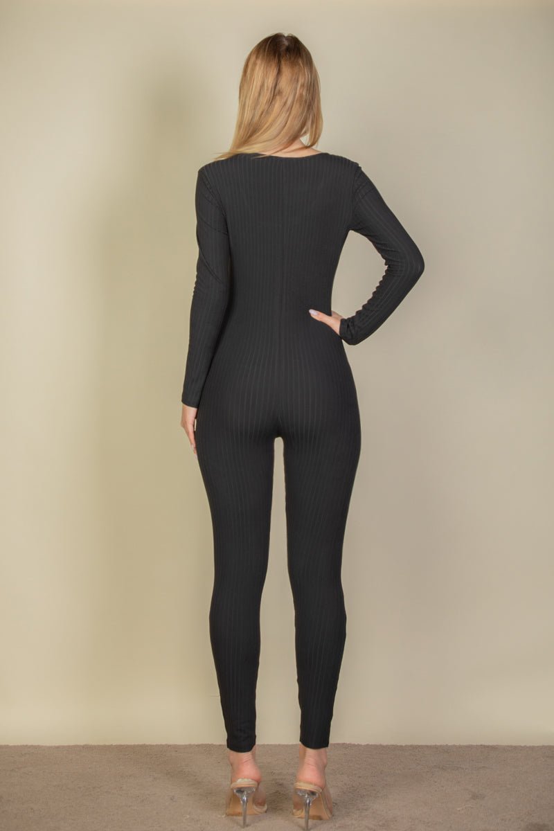 Back view of a black ribbed scoop neck long sleeve jumpsuit, made with soft and lightweight high-stretch fabric for comfort and style.