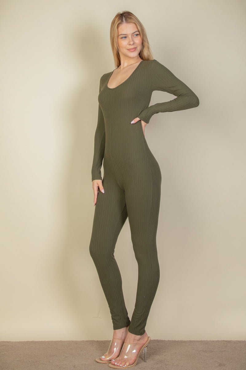 Woman wearing ribbed scoop neck long sleeve jumpsuit in olive green, made with soft high stretch rib knit fabric.