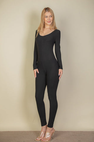 Ribbed scoop neck long sleeve jumpsuit in black, made from high stretch rib knit fabric with 92% polyester and 8% spandex.