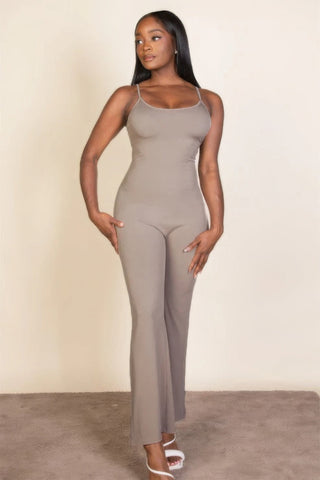 Ribbed sleeveless wide-leg jumpsuit in stretch fabric with spaghetti straps, offering a chic and comfy fit for a stylish look.