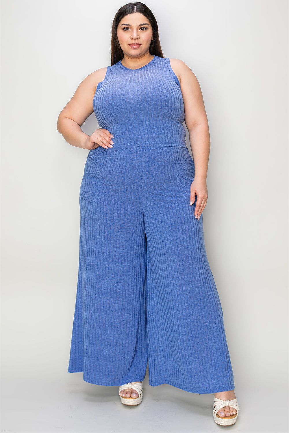 Plus size ribbed tank and wide leg pants set in blue, featuring a frill detail and pockets.