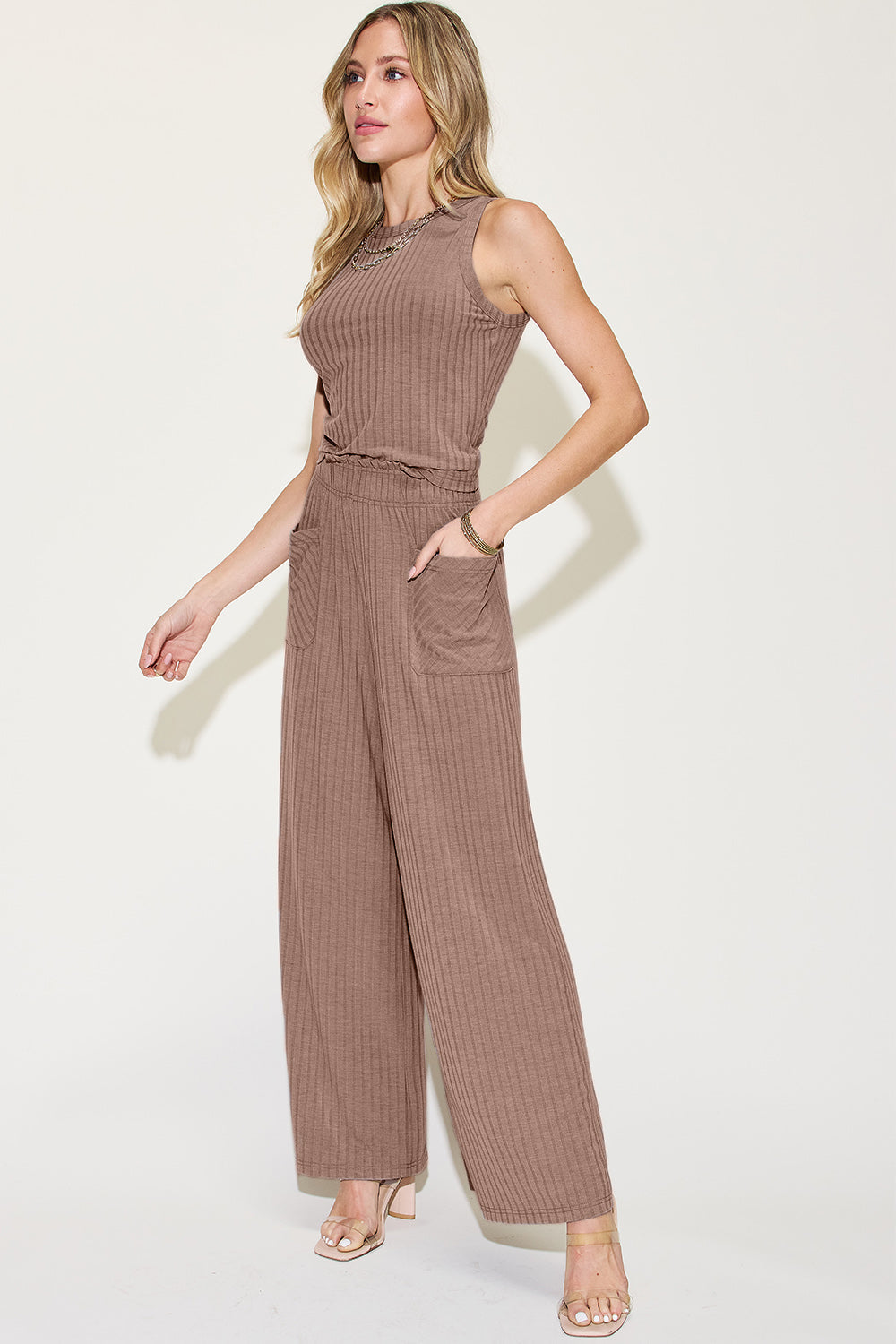 Ribbed tank and wide leg pants set in taupe with pockets, featuring frill detail and moderate stretch for comfortable wear.