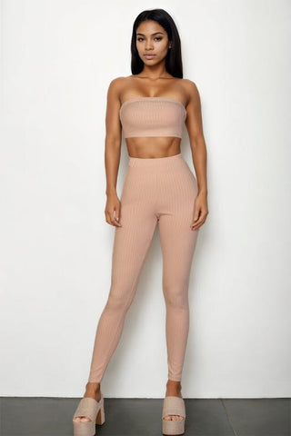 Ribbed tube top and leggings set in nude color, featuring polyester and spandex material.