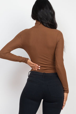 Back view of a model wearing a ribbed turtle neck long sleeve bodysuit in brown, showcasing high stretch rib knit texture.