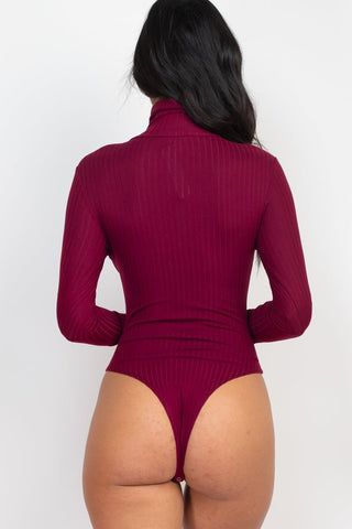 Back view of a maroon ribbed turtle neck long sleeve bodysuit showcasing high stretch fabric.