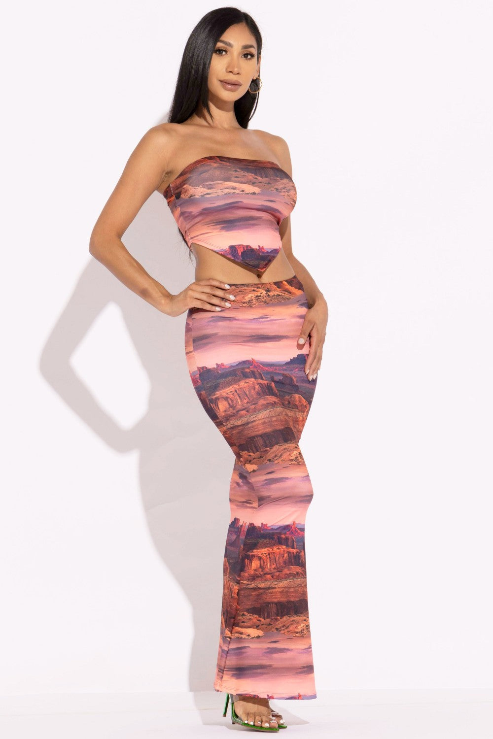 Rust printed tube top and maxi skirt set on model, stylish and vibrant outfit ideal for day-to-night wear.