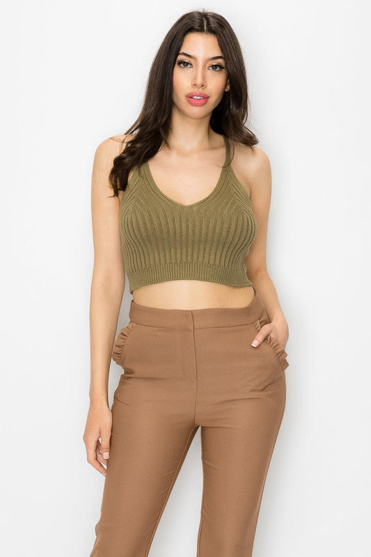 Olive scoop neck ribbed tank top with cami straps and cropped hem, styled with brown pants, sustainable fashion.