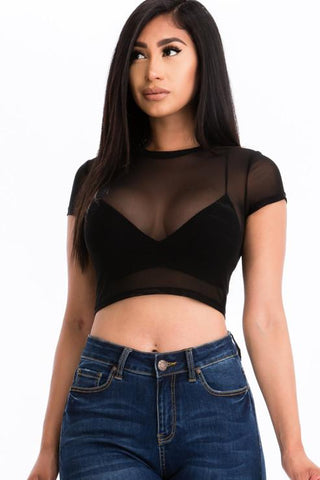Model wearing a black sexy mesh sheer short sleeve crop top with denim jeans, showcasing the stylish and lightweight design.