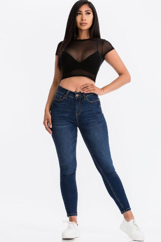 Sexy Mesh Sheer Short Sleeve Crop Top in black. Model is 5'8" wearing size small. Soft lightweight fabric: 90% Polyester, 10% Spandex.