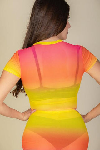 Back view of colorful mesh sheer short sleeve crop top, featuring vibrant ombre shades of pink, orange, and yellow. Lightweight and stylish.