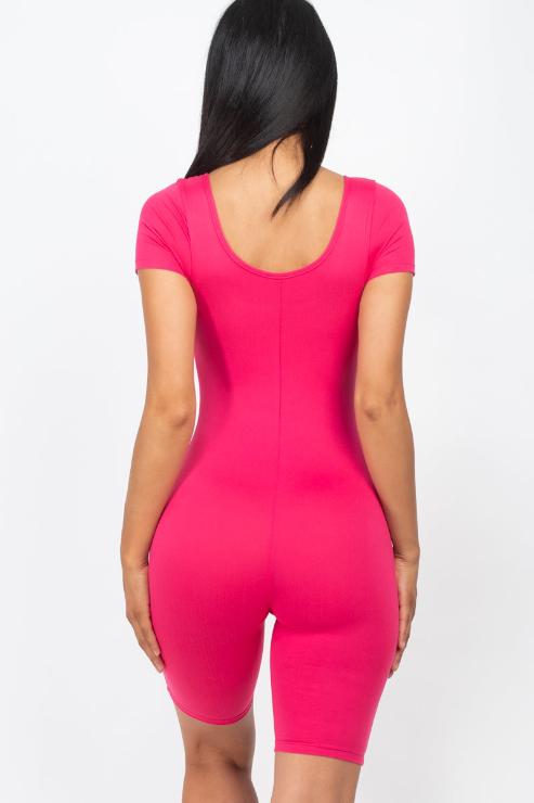 Back view of a bright pink short sleeve scoop neck bodycon romper, highlighting its snug fit and stretchy, lightweight fabric.
