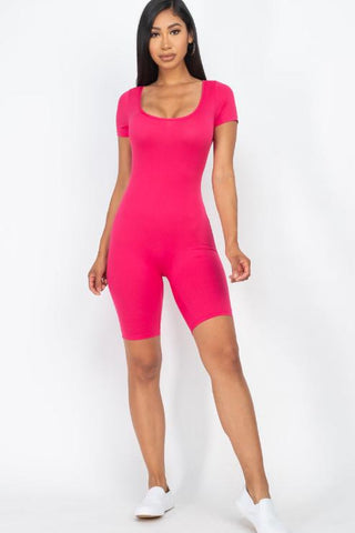 Model in pink short sleeve scoop neck bodycon romper, lightweight and stretchy with a comfortable fit, made of polyester and spandex.
