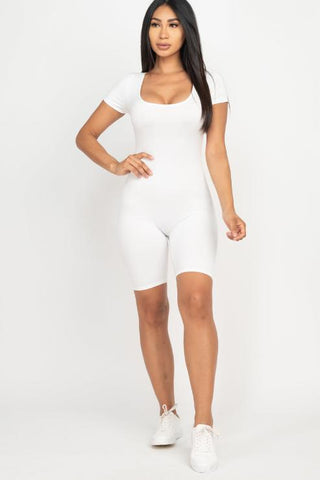 Short sleeve scoop neck bodycon romper in white, with stretchy, lightweight fabric for a comfortable fit. Model wearing size small.